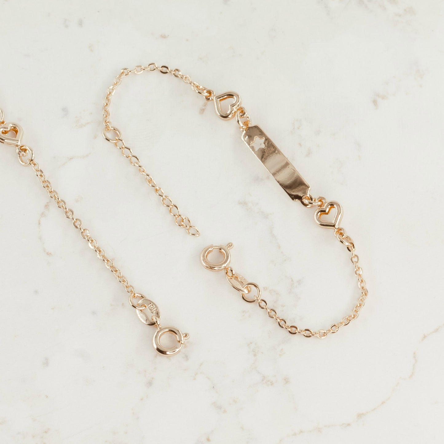 PULSERA PLACA ESTRELLA CORAZÓN AROS